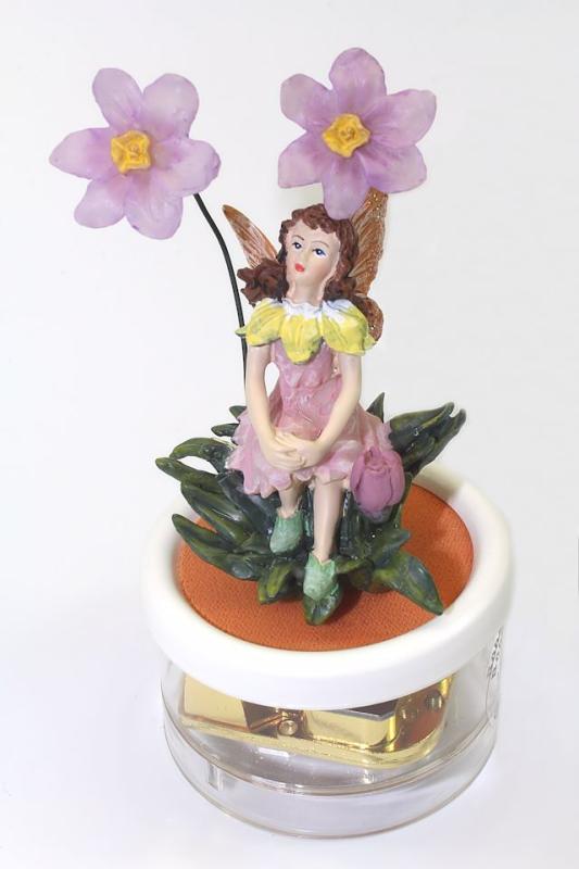 Briefbeschwerer mit Figur und Spieluhr