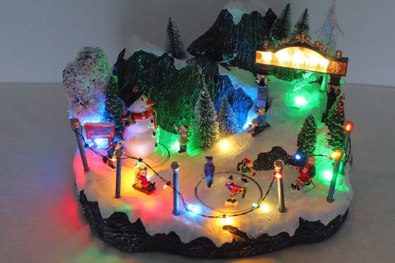 Spieluhr Winterszene mit Eisläufer